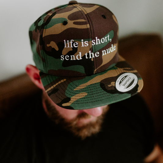 Send the N*de Camo Snapback